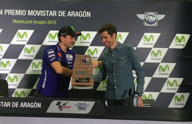 Photo 2 of 2
At the image from left to right, Jorge Lorenzo, rider with the Movistar Yamaha MotoGP team and Marc García Rojals, designer and creator of the trophy.