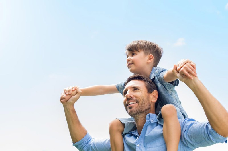 A father and a son enjoying work-life balance