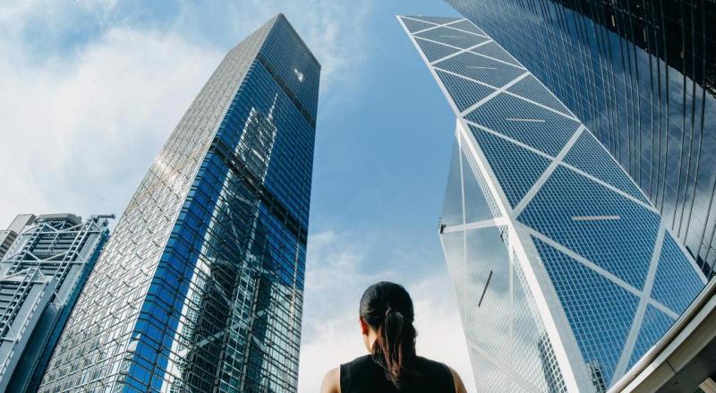 Internal control policy: person looking at skyscrapers