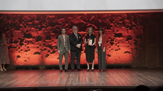 Ana Porto, second from right, receives recognition from Merco